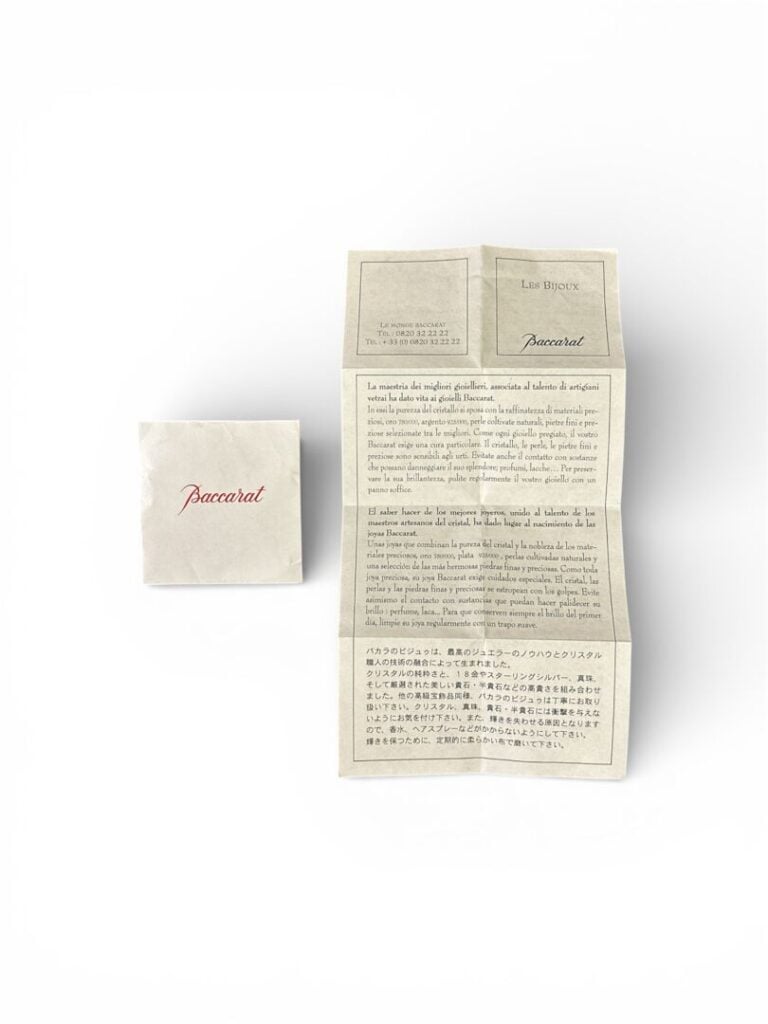 BACCARAT - Bracelet modèle "Coquillage" en cristal orangé souligné d'un liseré…