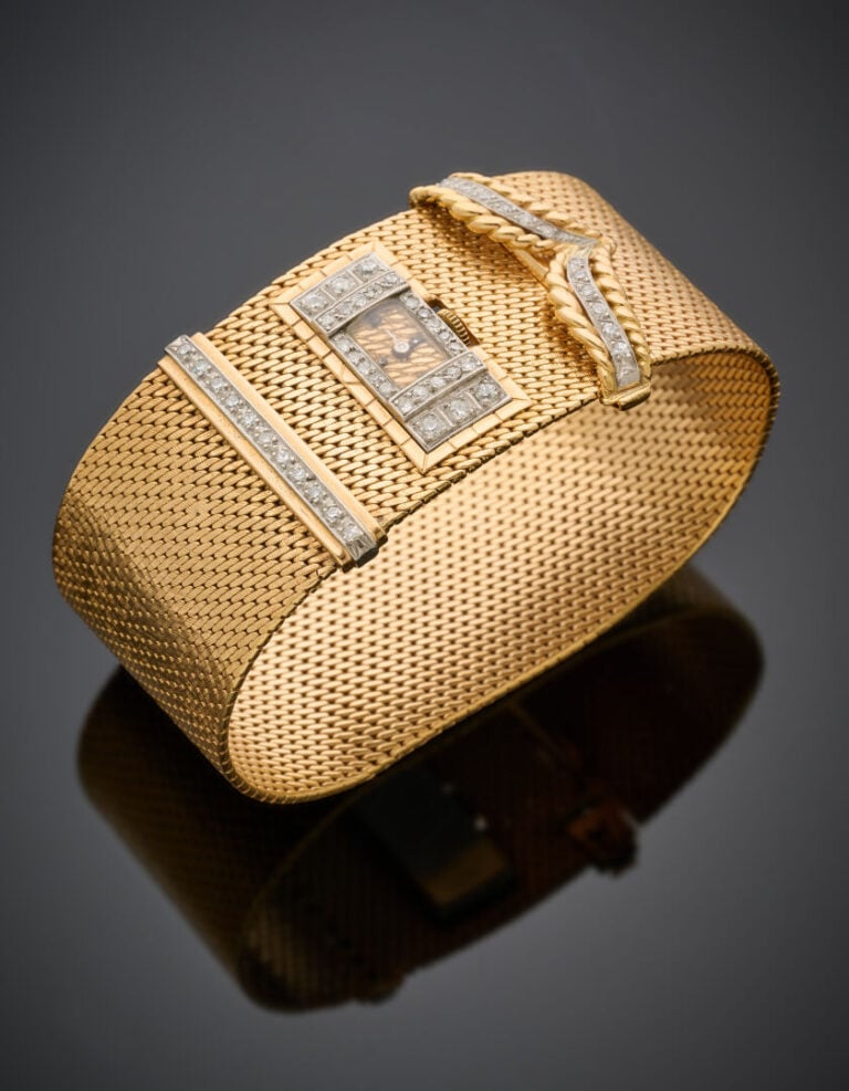 BETTETINI - BRACELET MONTRE manchette souple en or jaune (750‰) serti de diaman…
