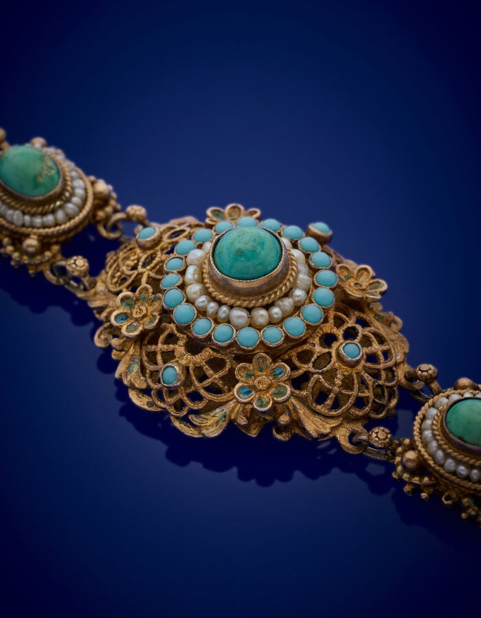 BRACELET articulé en vermeil (min. 800‰) ajouré torsadé et boulé, orné de huit…