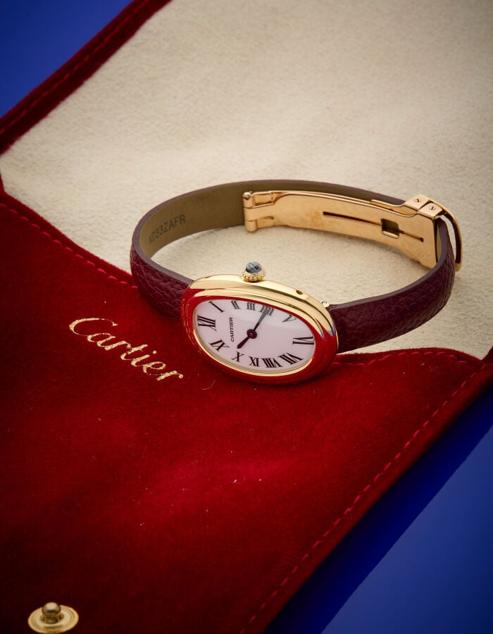 CARTIER - BRACELET MONTRE ovale, de dame, modèle "Baignoire" en or jaune (750%)…