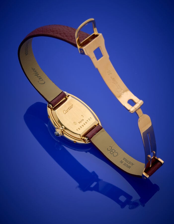 CARTIER - BRACELET MONTRE ovale, de dame, modèle "Baignoire" en or jaune (750%)…