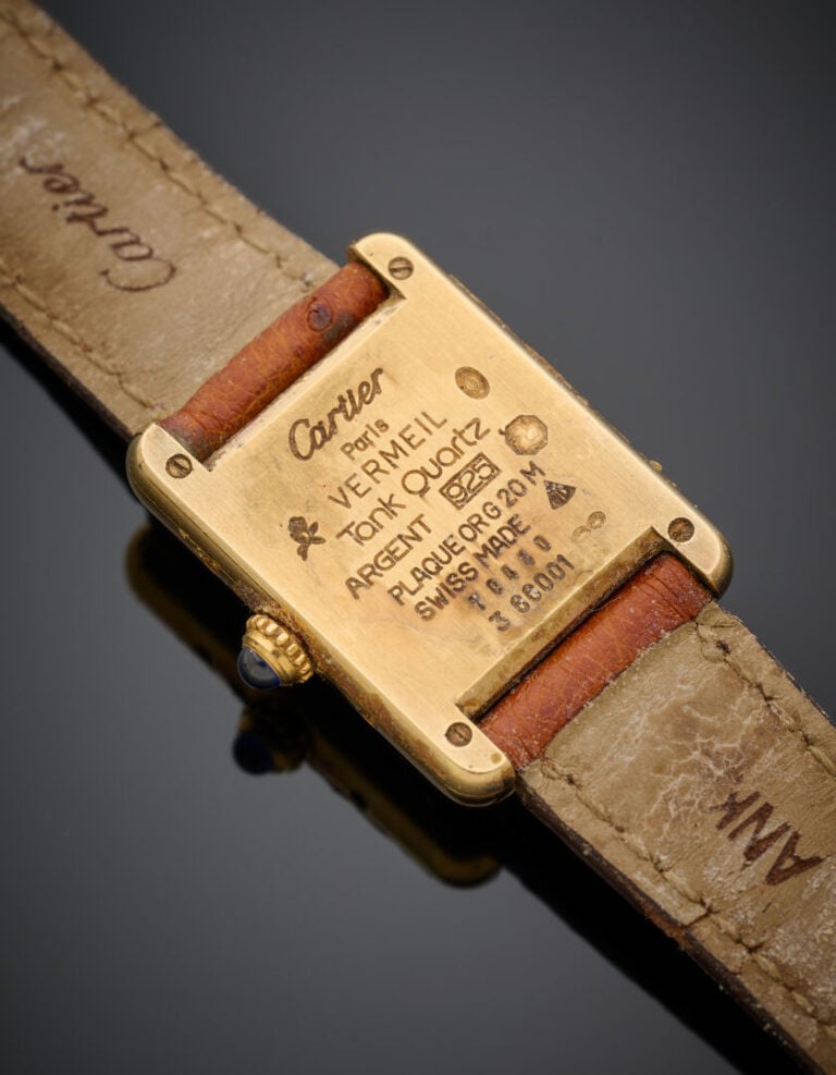 CARTIER - BRACELET MONTRE rectangulaire de dame, modèle "Tank" en vermeil (925‰…