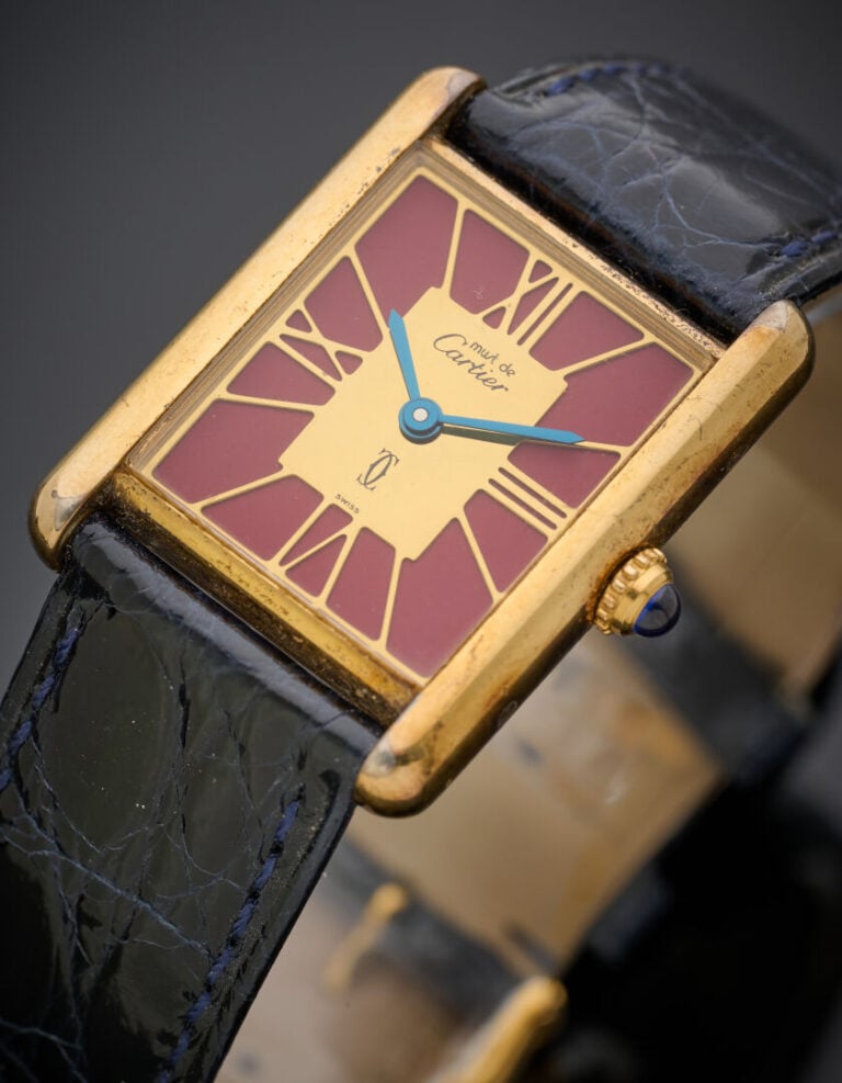 CARTIER - BRACELET MONTRE rectangulaire, modèle "Tank" argent (925‰) plaqué or.…
