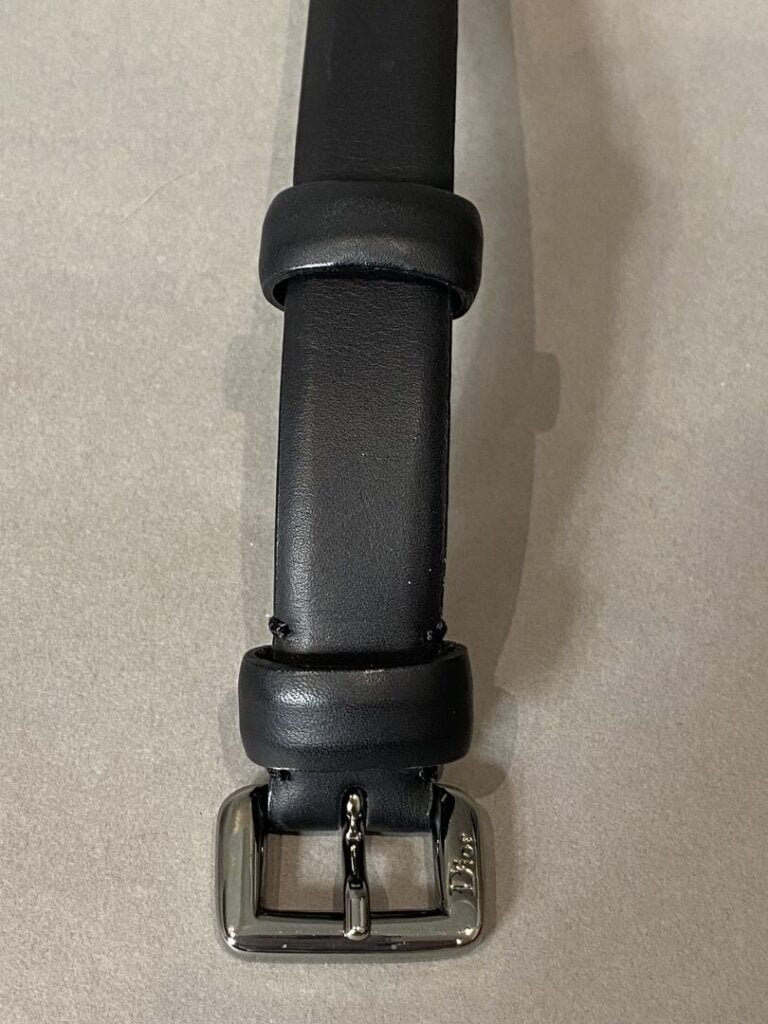 CHRISTIAN DIOR - Ceinture en cuir noir, boucle en métal noirci signée - Taille…