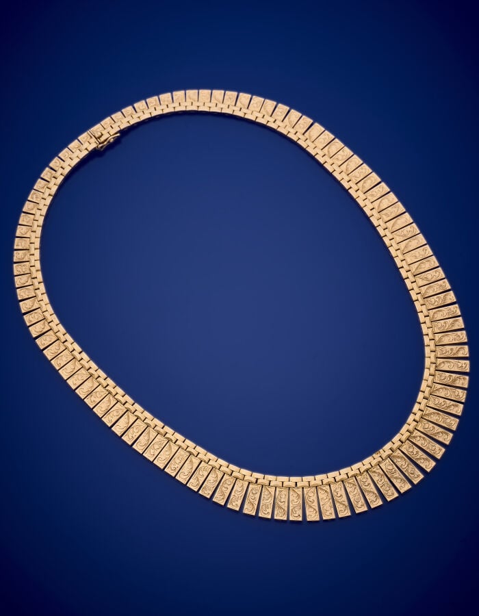 COLLIER "frange" en or rose (750‰) à maille brique retenant des motifs rectangu…