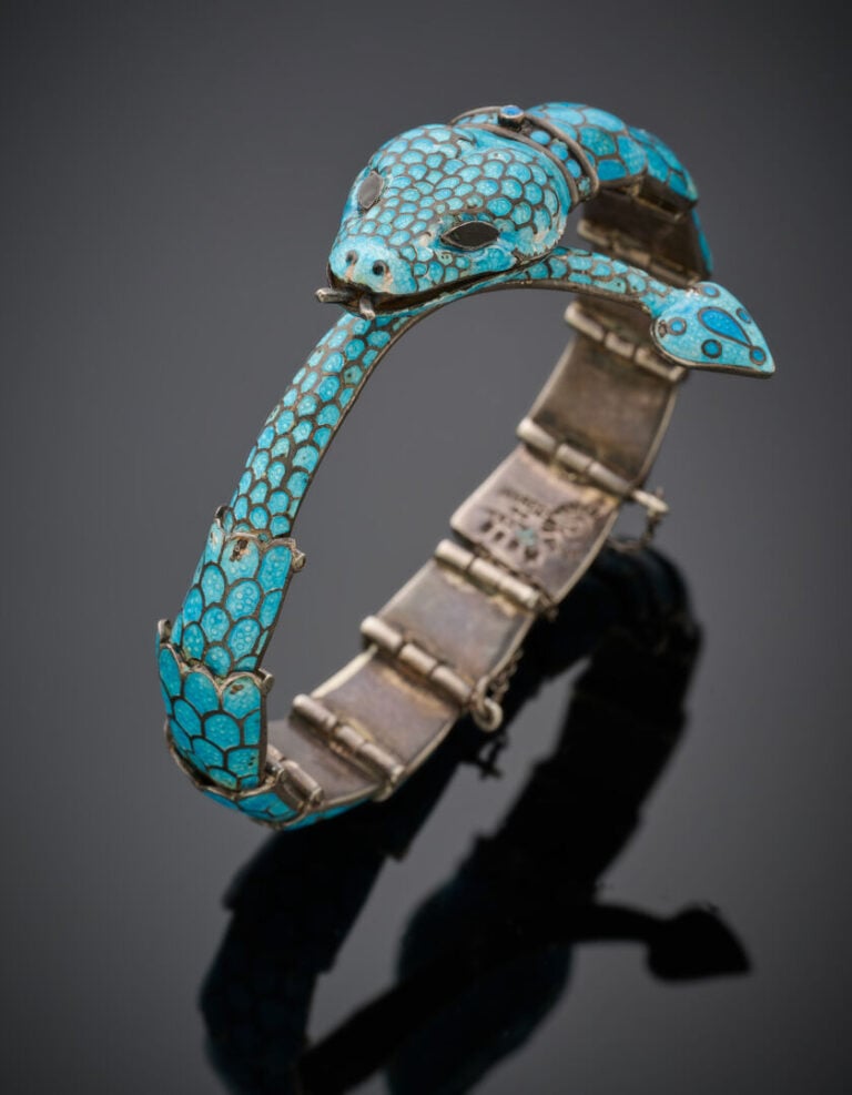 DEMI-PARURE "Serpent" en argent (925‰) comprenant un BRACELET articulé et une p…