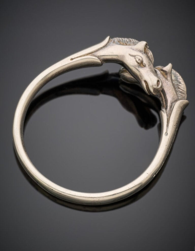 HERMES - BRACELET rigide "Galop" en argent (800‰). - Signé HERMES. - Long.: 19,…