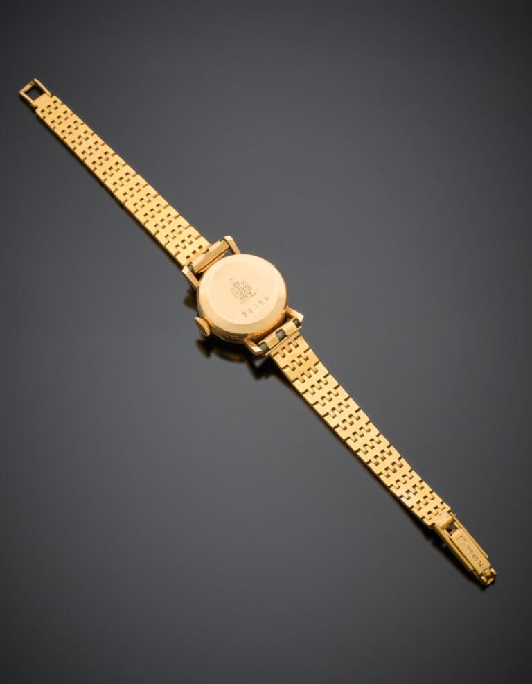 LIP - BRACELET MONTRE ronde de dame en or jaune (750°/°°). - Cadran crème, chif…