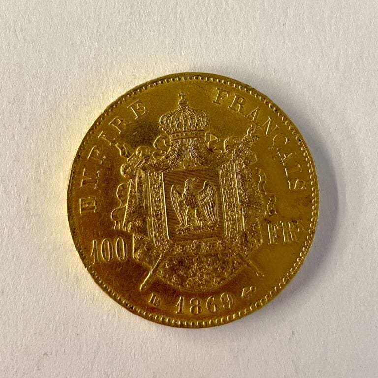 1 Pièce de 100 Francs or Empire Français 1869 Napoléon III tête laurée. Poids :…