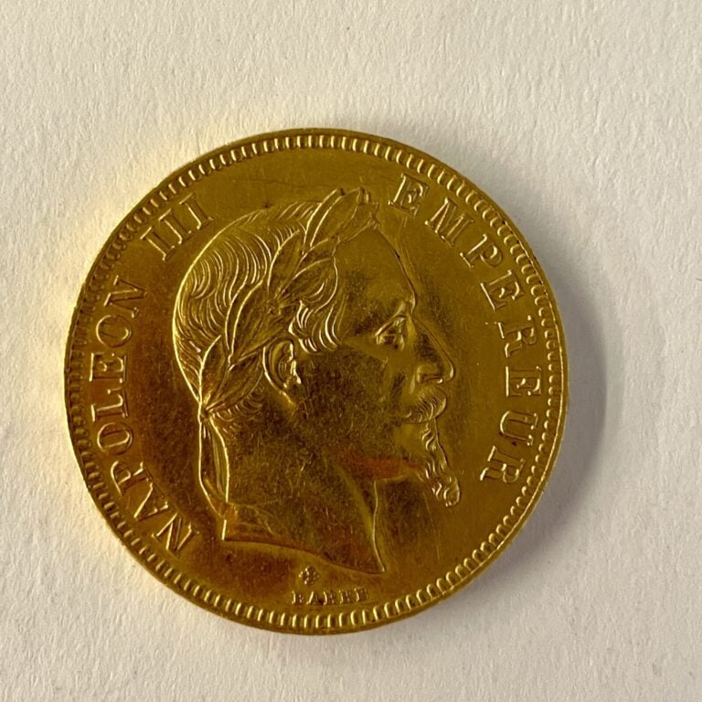1 Pièce de 100 Francs or Empire Français 1869 Napoléon III tête laurée. Poids :…
