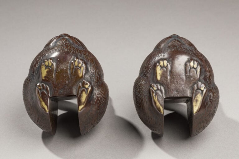 JAPON - XXème siècle - Paire de supports de paravent en bronze, en forme de lap…