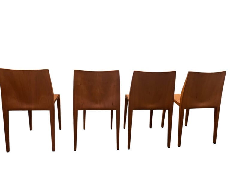 TRAVAIL SCANDINAVE (?), XXe siècle - Suite de quatre chaises en bois thermoform…