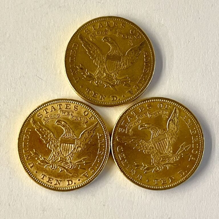 Trois pièces de 10 dollars or 1882. Poids : 50.06g