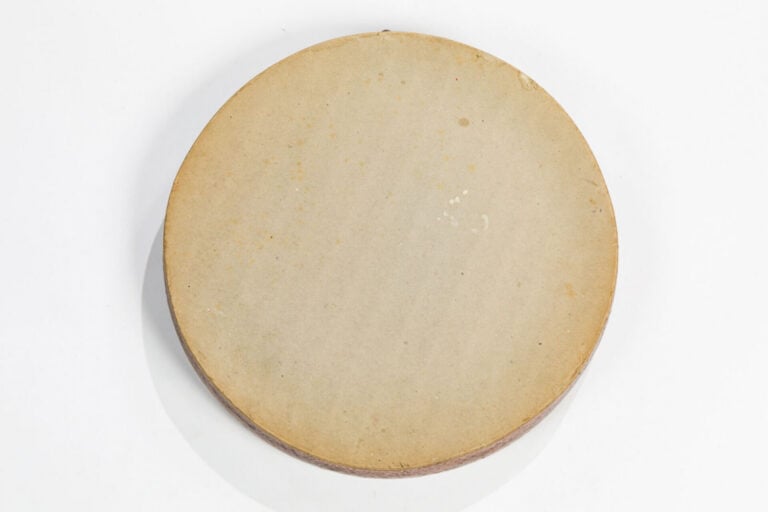 ANDRÉ BODIN (1928-2020) - Miroir circulaire bombé en grès émaillée brun à décor…