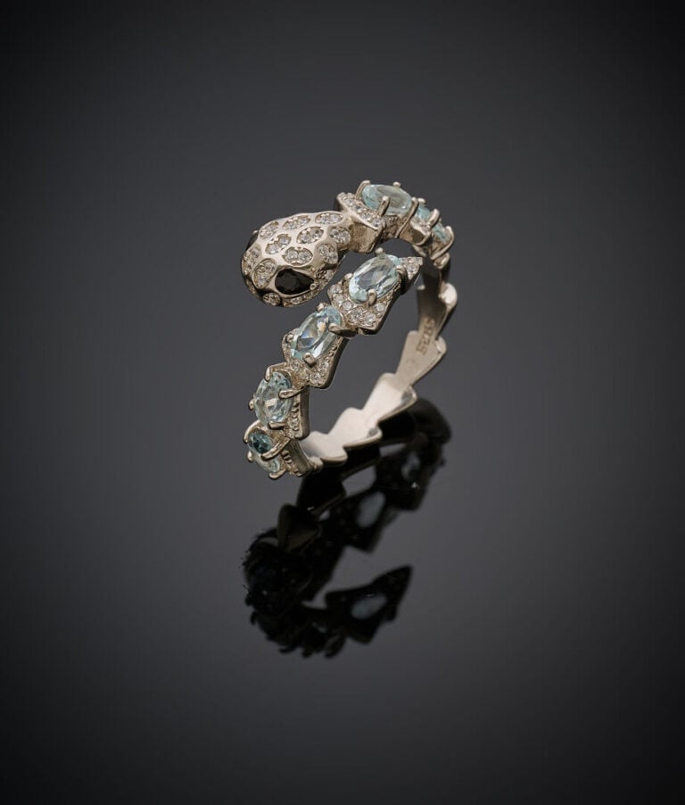BAGUE "serpent" en argent (925‰) serti d'aigues-marines et pierres blanches et…