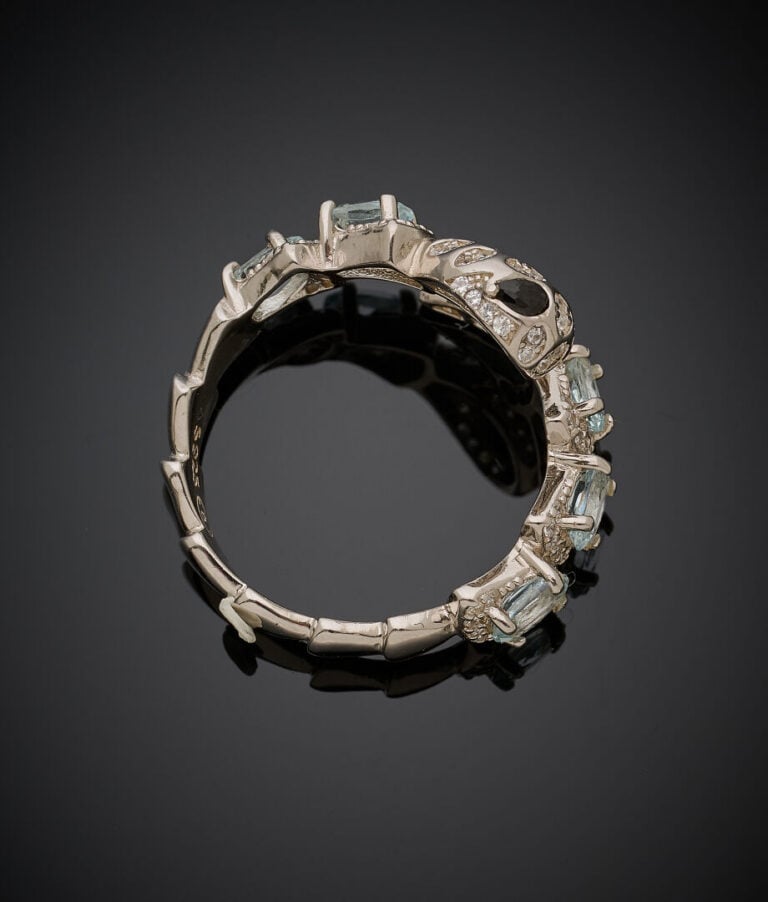 BAGUE "serpent" en argent (925‰) serti d'aigues-marines et pierres blanches et…