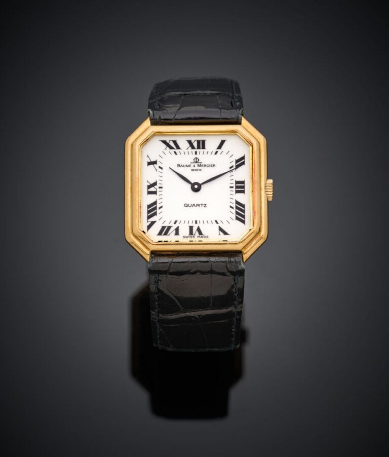 BAUME & MERCIER - BRACELET MONTRE octogonale de dame en or jaune (750‰). - Lune…