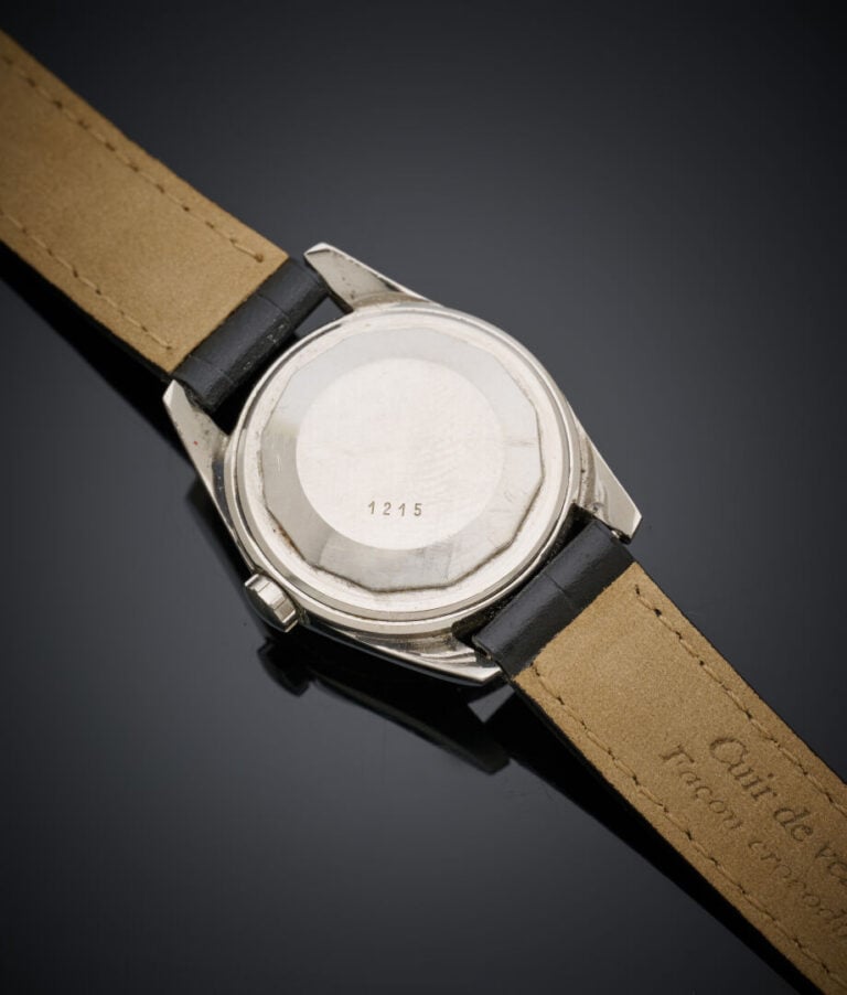 BAUME & MERCIER - BRACELET MONTRE ronde de dame en acier "Baumatic". - Lunette…