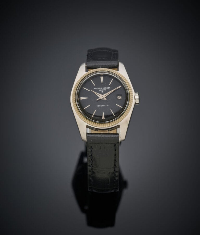 BAUME & MERCIER - BRACELET MONTRE ronde de dame en acier "Baumatic". - Lunette…