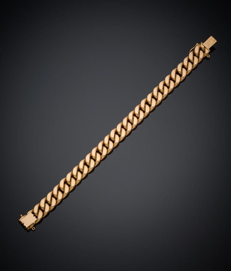 BRACELET gourmette limée en or jaune (750‰). - Long.: 18,6 cm. Poids brut : 26,…