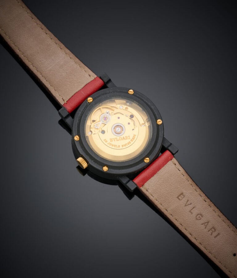 BULGARI - BRACELET MONTRE ronde, "Jeddah", en acier pvd noir. Cadran noir, chif…