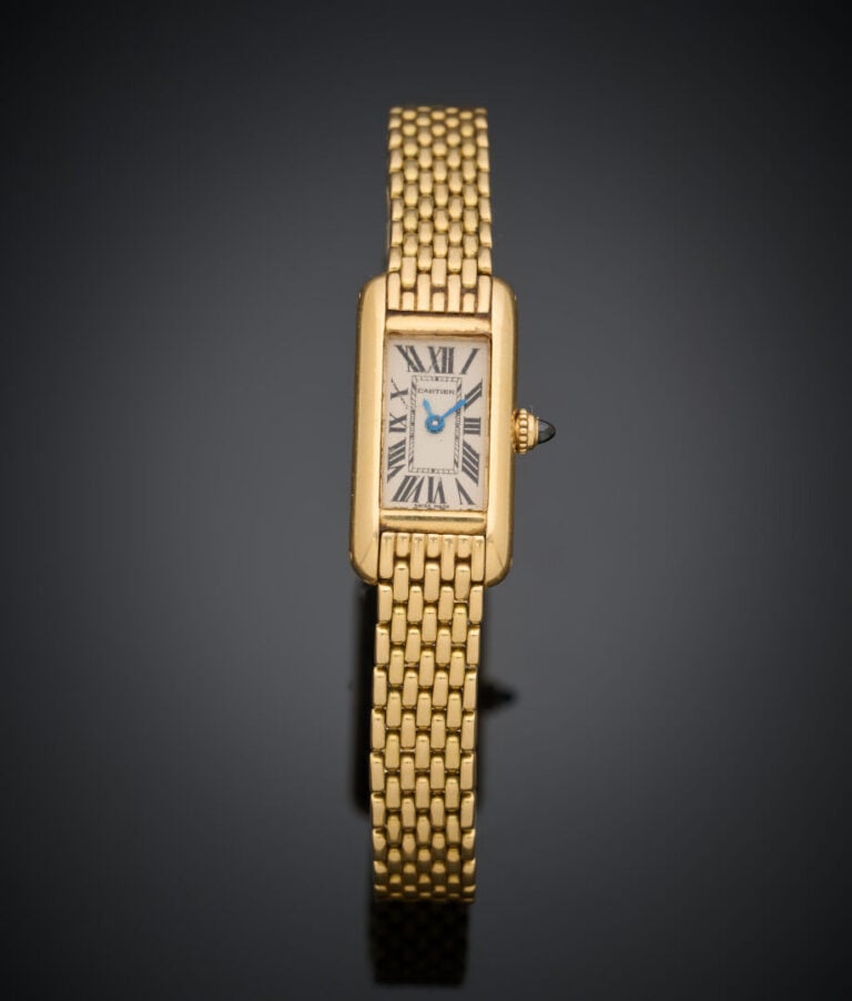 CARTIER - BRACELET MONTRE rectangulaire de dame, modèle "Tank", en or jaune (75…