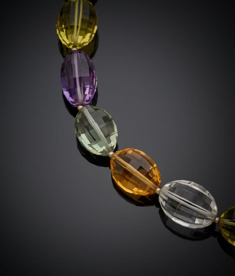 COLLIER composé de perles ovales facettées d'améthystes, citrines, prasiolites,…