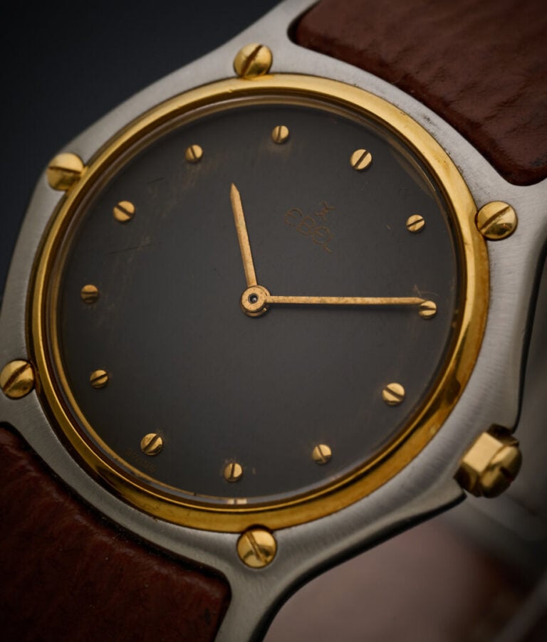 EBEL - BRACELET MONTRE ronde, modèle "Wave", en acier et métal doré. - Cadran a…