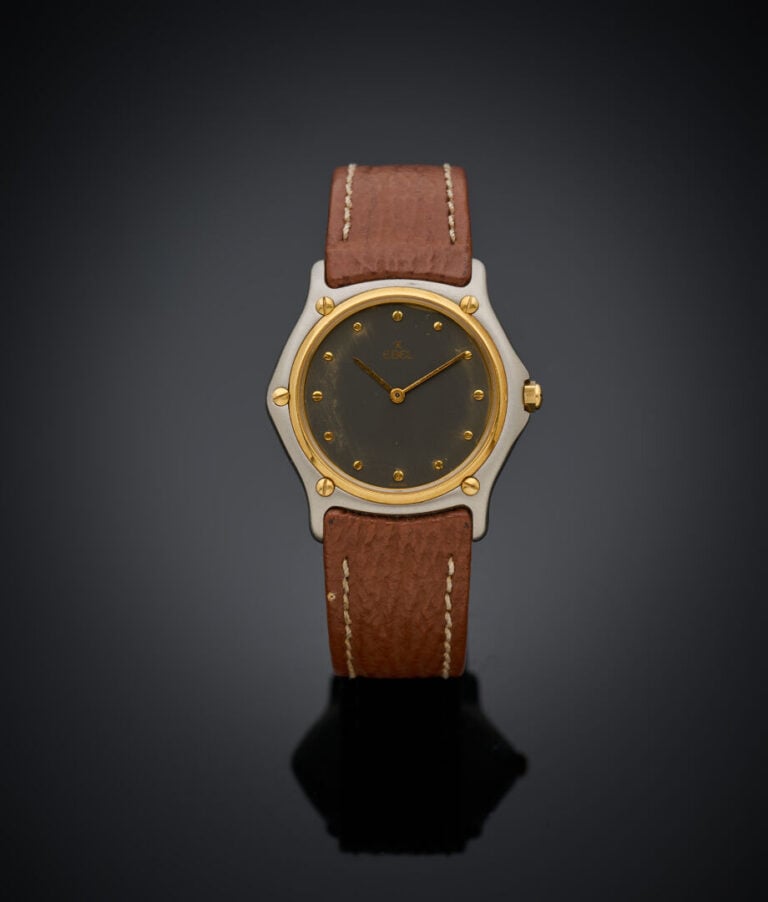 EBEL - BRACELET MONTRE ronde, modèle "Wave", en acier et métal doré. - Cadran a…