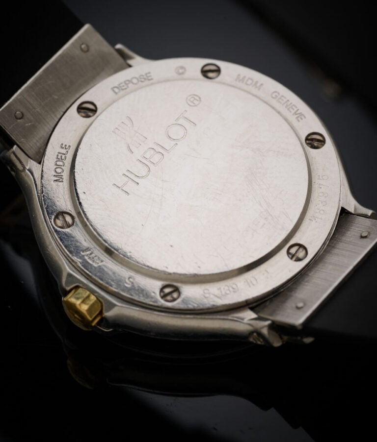 HUBLOT - MDM - BRACELET MONTRE ronde en or jaune (750‰) et acier. Attaches et l…