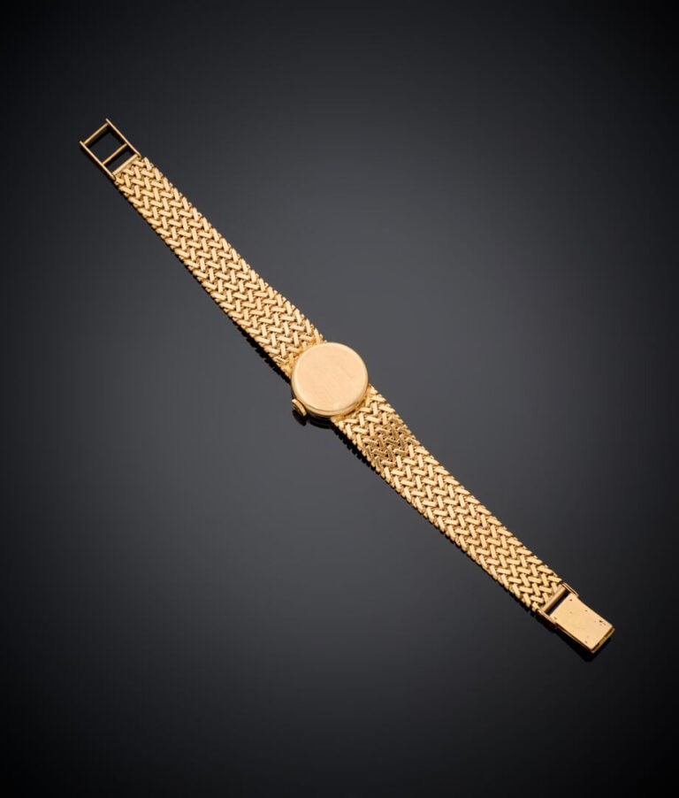 LONGINES - BRACELET MONTRE de dame ronde en or rose et jaune (750‰). Cadran crè…