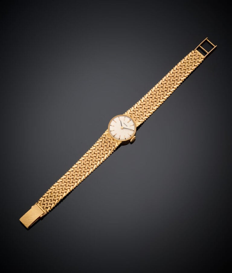 LONGINES - BRACELET MONTRE de dame ronde en or rose et jaune (750‰). Cadran crè…