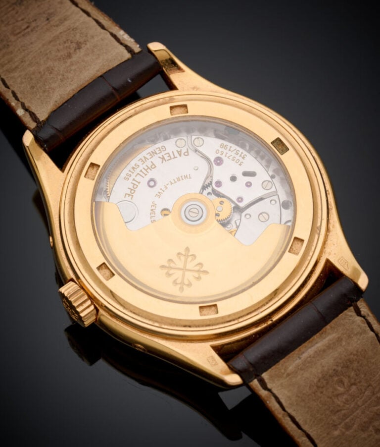 PATEK PHILIPPE - BRACELET MONTRE ronde, modèle "Annual Calendar", en or jaune (…