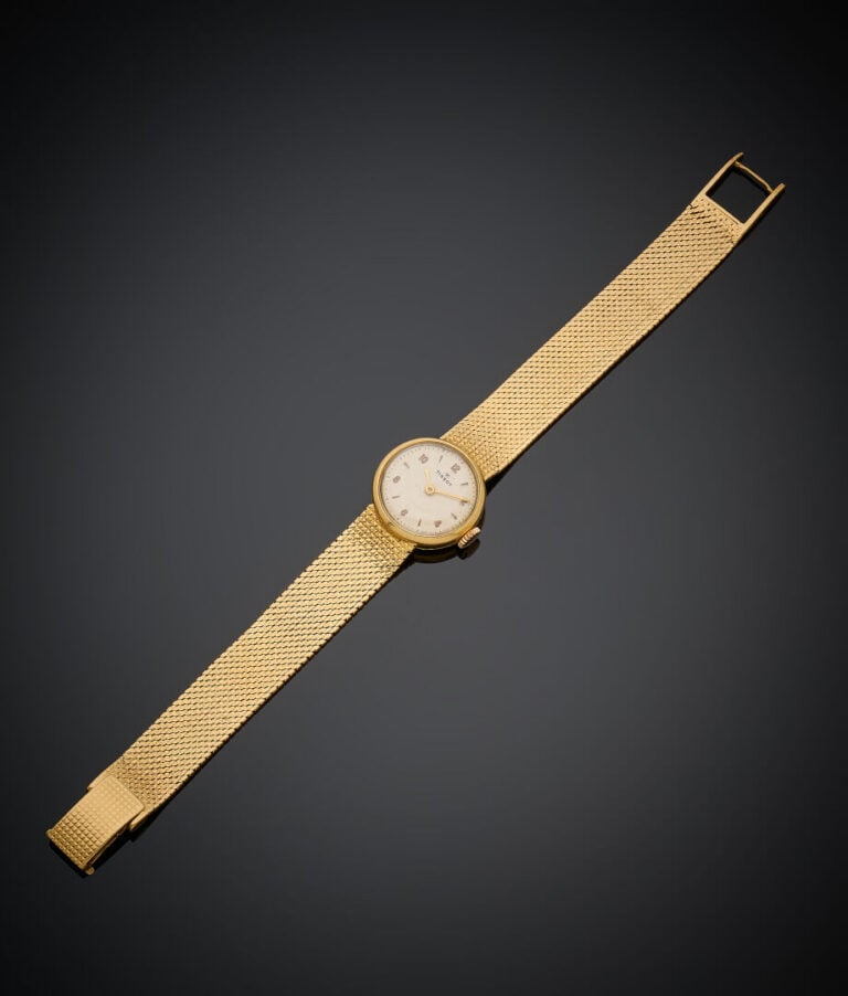 TISSOT - BRACELET MONTRE ronde de dame en or jaune (750‰) Cadran crème satiné,…