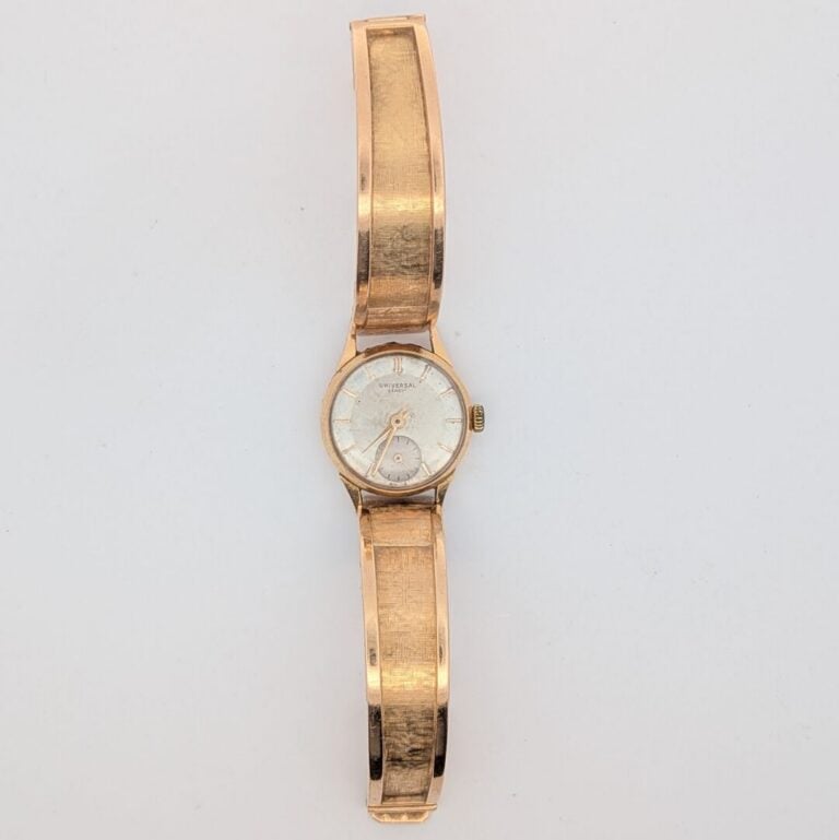 UNIVERSAL - BRACELET MONTRE ronde de dame en or jaune (750‰). Cadran silver, in…