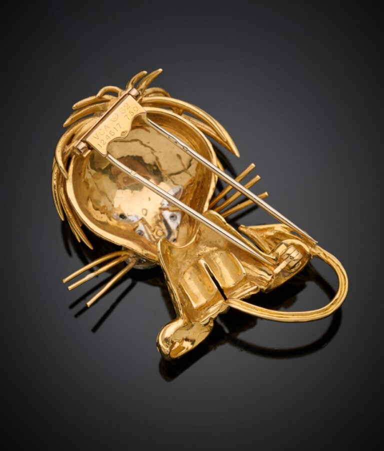 VAN CLEEF & ARPELS - BROCHE "Lion ébouriffé" en or jaune (750‰) ciselé. Le nez…