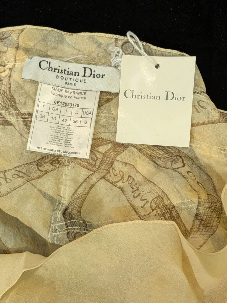 CHRISTIAN DIOR - Jupe en soie doublée jaune paille à motifs équestres et garnit…