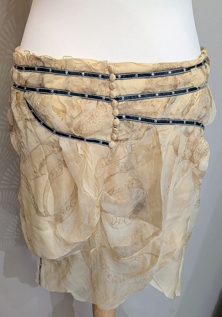 CHRISTIAN DIOR - Jupe en soie doublée jaune paille à motifs équestres et garnit…