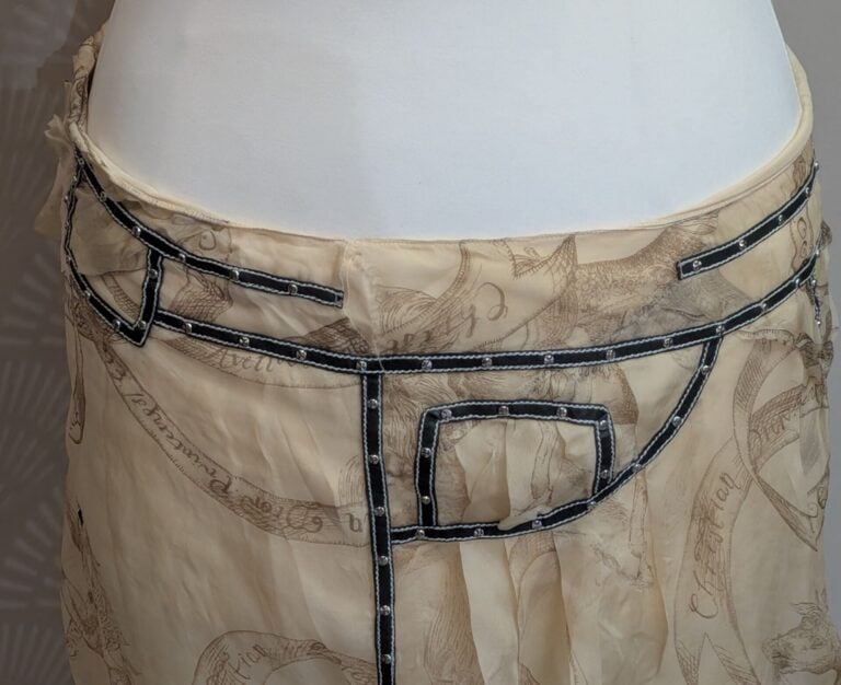 CHRISTIAN DIOR - Jupe en soie doublée jaune paille à motifs équestres et garnit…