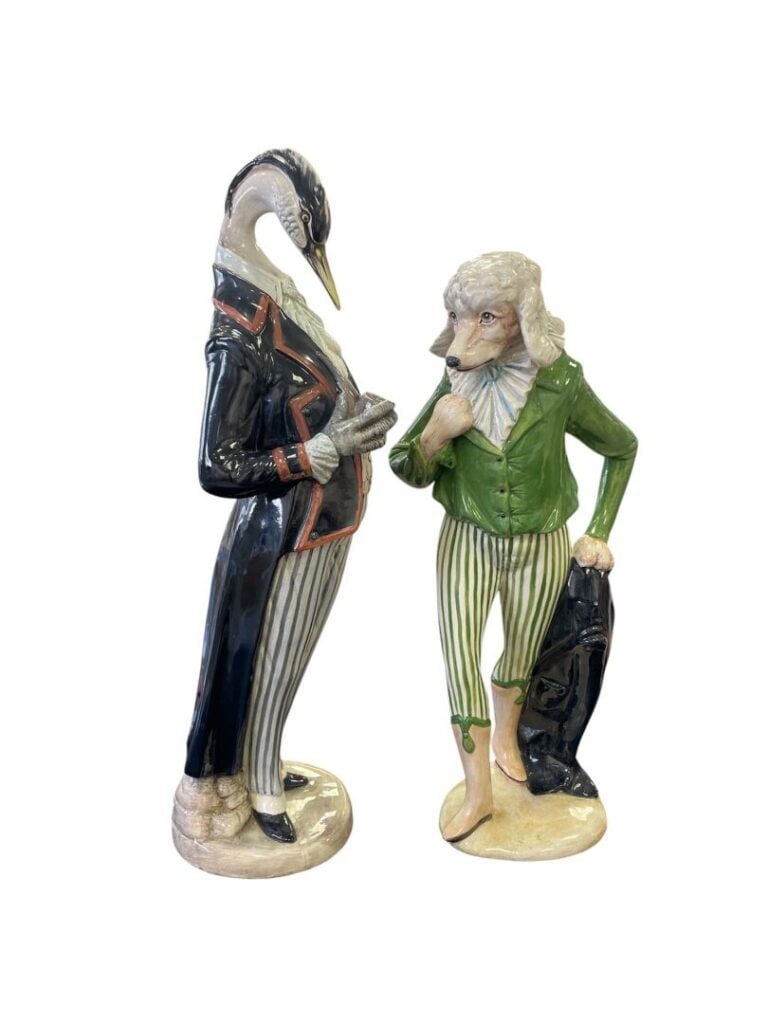 ITALIE - Deux sujets en porcelaine figurant des hommes costumés à tête de canic…