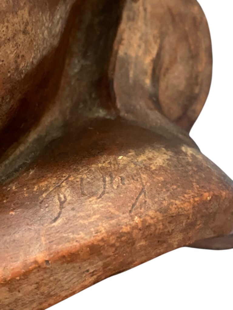Tête de putto en terre cuite - Porte une signature J. OBAY? - H : 40 cm