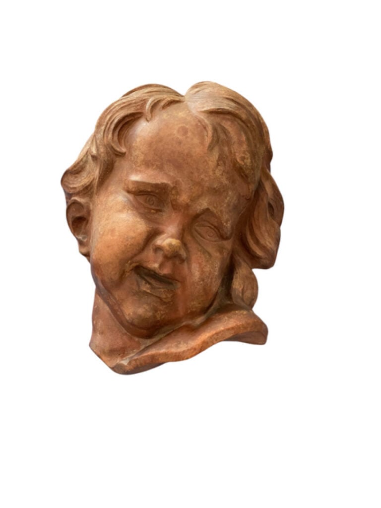 Tête de putto en terre cuite - Porte une signature J. OBAY? - H : 40 cm